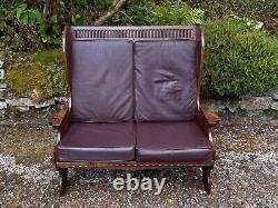 A Nigel Griffiths Oak Two Seater Leather Fireside Chair Settee Winged Armchair