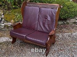 A Nigel Griffiths Oak Two Seater Leather Fireside Chair Settee Winged Armchair
