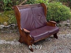 A Nigel Griffiths Oak Two Seater Leather Fireside Chair Settee Winged Armchair