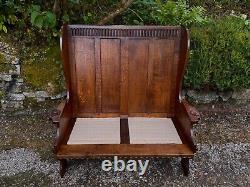 A Nigel Griffiths Oak Two Seater Leather Fireside Chair Settee Winged Armchair