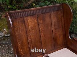 A Nigel Griffiths Oak Two Seater Leather Fireside Chair Settee Winged Armchair