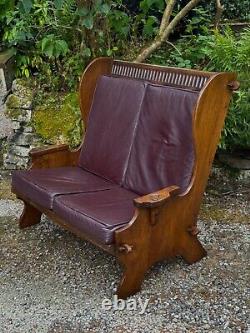 A Nigel Griffiths Oak Two Seater Leather Fireside Chair Settee Winged Armchair