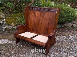 A Nigel Griffiths Oak Two Seater Leather Fireside Chair Settee Winged Armchair