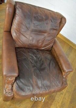 Aged brown tan leather wingback fireside tub chair armchair