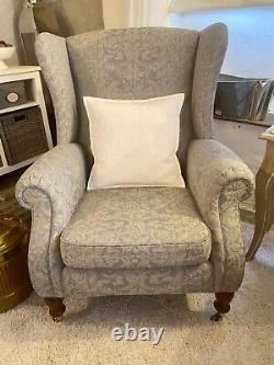 Beautiful Parker Knoll Fireside Wingback armchair With Brass Castors