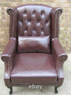 Brown Wing Backed Fireside Armchair