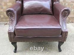 Brown Wing Backed Fireside Armchair