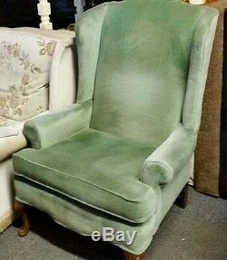 Fireside chair, green wing back