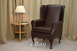 High Wingback Fireside Chair Chestnut Faux Leather Seat Easy Armchair Resin Leg