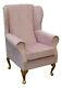 High Wingback Fireside Chair In Blossom Pink Fabric With Gold Studding Detail