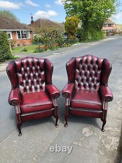 Leather chesterfield Oxblood red Queen Anne fireside chairs CAN DELIVER