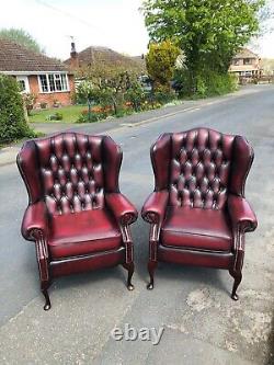 Leather chesterfield Oxblood red Queen Anne fireside chairs CAN DELIVER