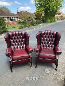 Leather chesterfield Oxblood red Queen Anne fireside chairs CAN DELIVER