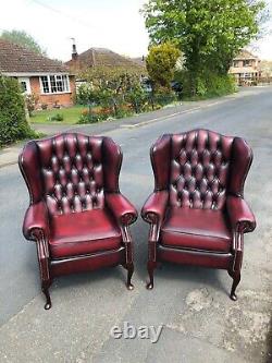 Leather chesterfield Oxblood red Queen Anne fireside chairs CAN DELIVER