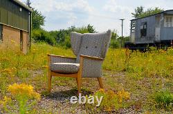 Newly upholstered, Parker Knoll, Wingback fireside armchair with Linwood fabric