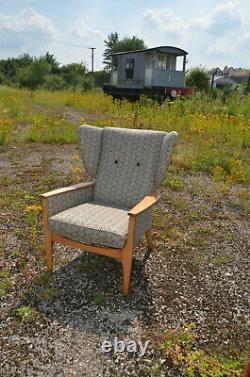 Newly upholstered, Parker Knoll, Wingback fireside armchair with Linwood fabric