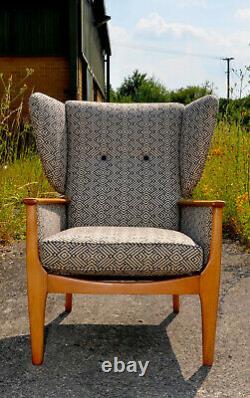 Newly upholstered, Parker Knoll, Wingback fireside armchair with Linwood fabric