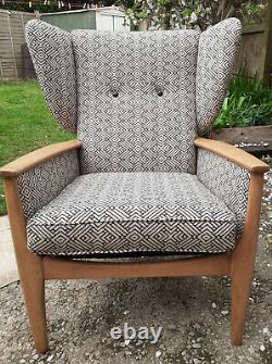 Newly upholstered, Parker Knoll, Wingback fireside armchair with Linwood fabric