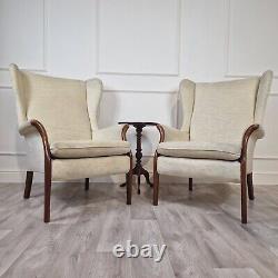 Pair Of 20th Century Beech Framed Wing Backed Fireside Chairs F208