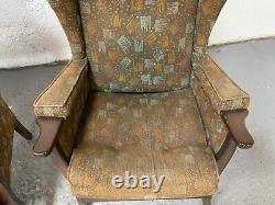 Pair of Vintage Green Fabric Wing Back Fire Side Armchairs with Wooden Legs