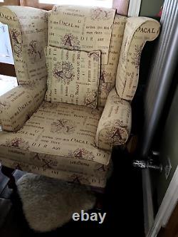 Vintage Latin Themed High Back Winged Fireside Armchair with Queen Anne Legs