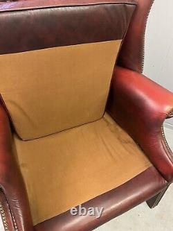 Vintage oxblood leather wingback Fireside chesterfield armchair