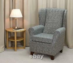 Wingback Fireside Armchair Chair in a Como Charcoal Grey Fabric Extended Base